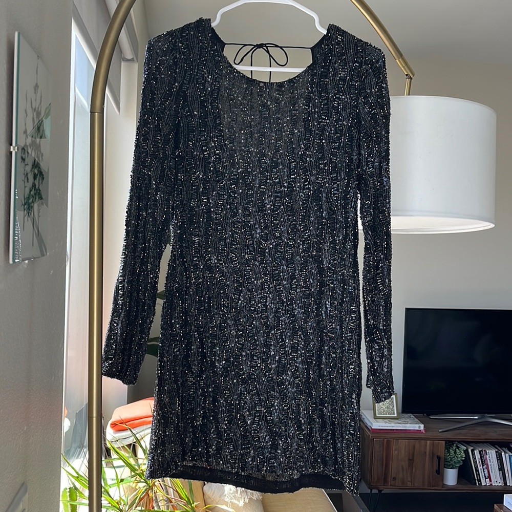 Glam long sleeve mini dress with open back